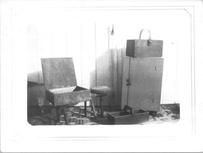 SA0659 - An unidentified photo perhaps showing shoe making equipment. Includes various boxes and a cobbler